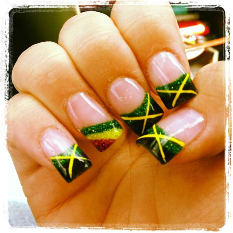 Be sure to use two highly contrasting colors – such as black and nude – to make the sharp patterns pop. . Jamaican nail designs